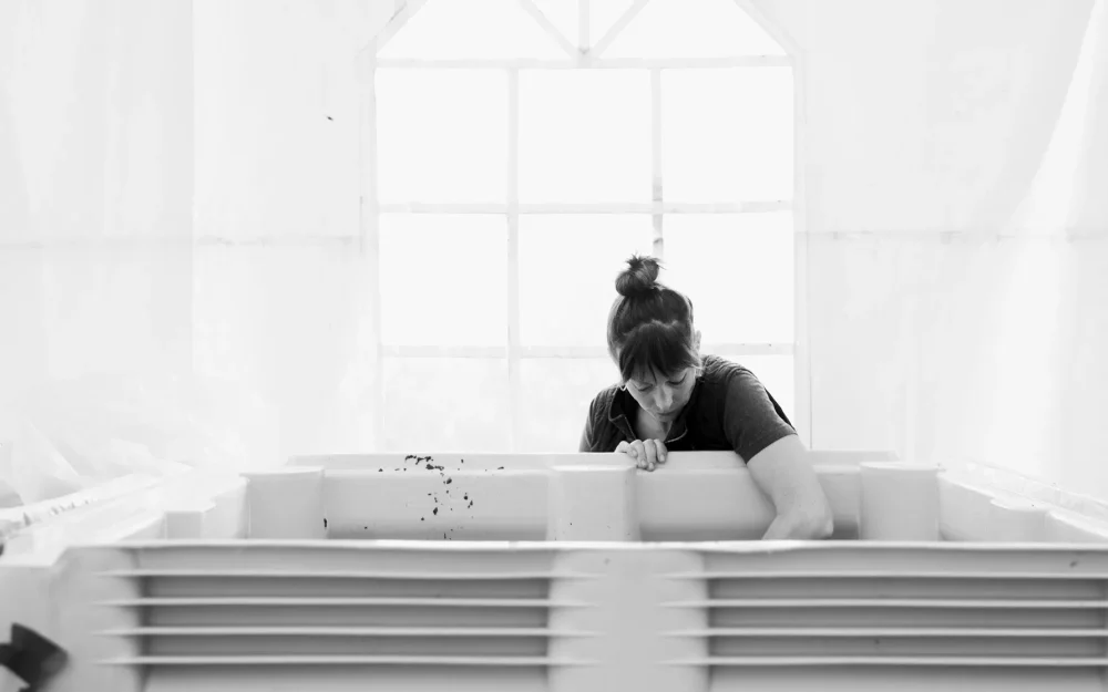 Rachel Rose, testing grapes from harvest