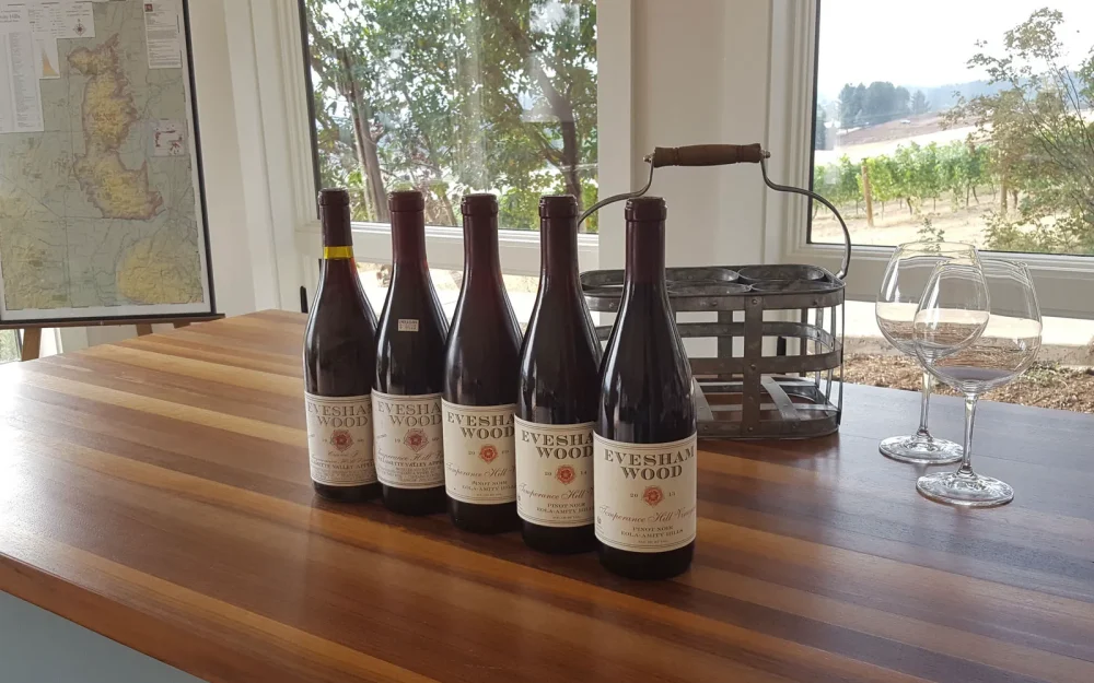 Lineup of Evesham Wood wine bottles