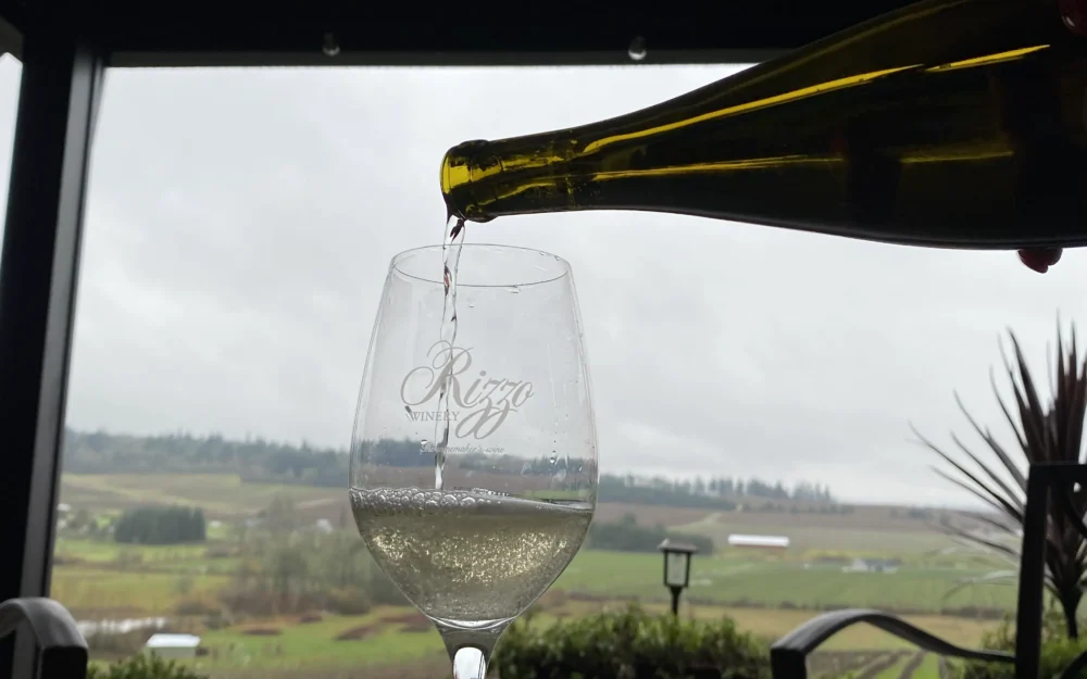 Pouring a glass of Rizzo wine